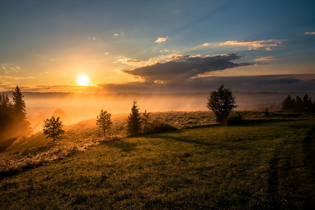 Sunrise over a peaceful countryside